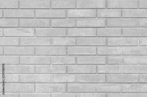 Smooth brickwork. Wall of gray bricks. Background for sites and layouts.