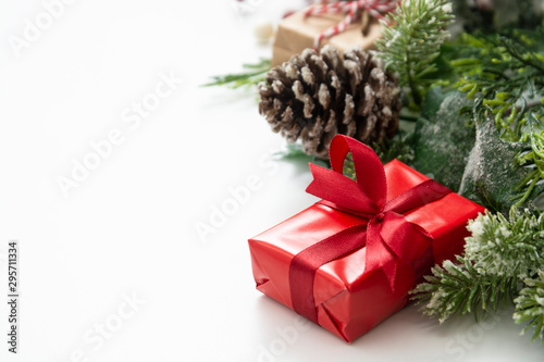 Christmas red gifts presents on isolated background. Festive holiday decorations on white background with copy space.