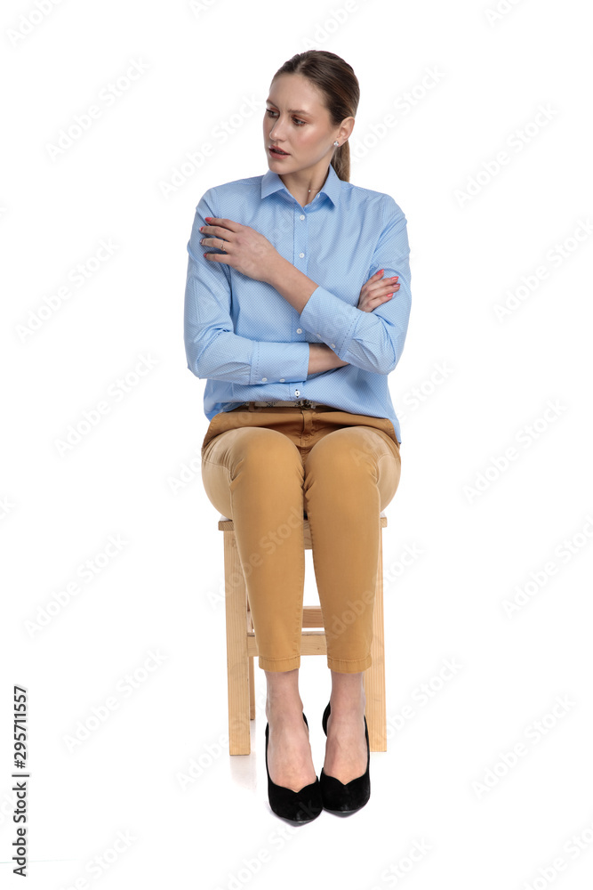 concerned young businesswoman wearing blue shirt concerned young businesswoman wearing blue shirt