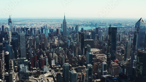 High aerial of Manhattan, drone shooting of New York City, skyscrapers and landmark buildings, famous cityscape