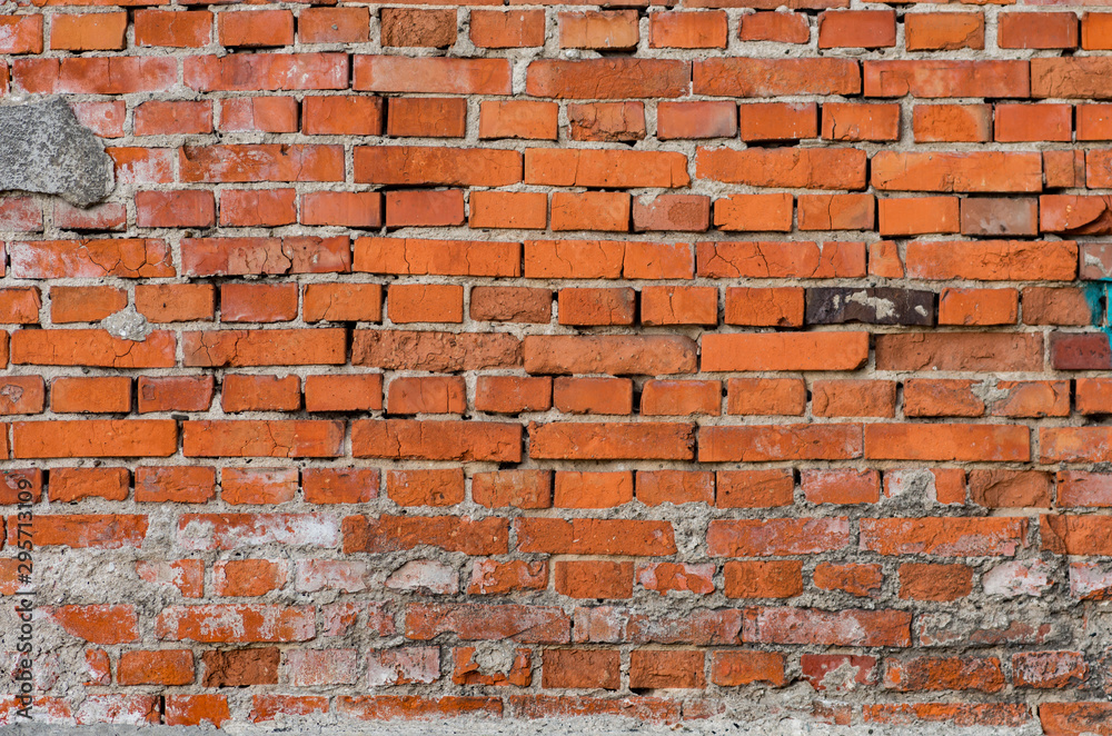 Obraz premium weathered red brick wall background