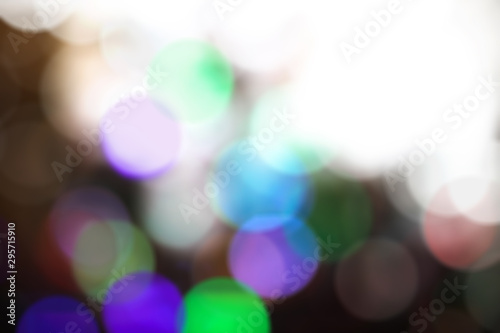 Beautiful Christmas background with garlands and bokeh. New year multi-colored picture. Abstract photo image for design