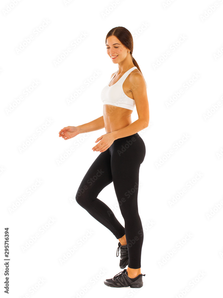 Young healthy girl doing exercises, full length portrait isolated over white background Young healthy girl doing exercises, full length portrait isolated over white background