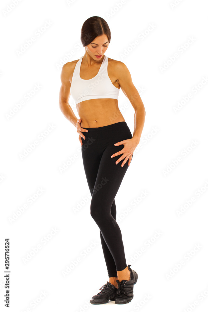 Young healthy girl doing exercises, full length portrait isolated over white background Young healthy girl doing exercises, full length portrait isolated over white background