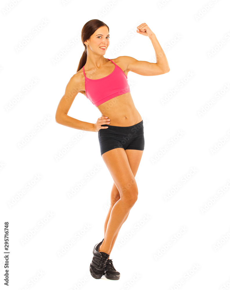 Young fitness brunette woman in red top and black shorts Young fitness brunette woman in red top and black shorts