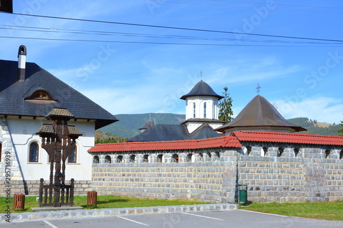 Romanian Orthodox complex and monastery located on the Carpathian Mountains, at Izvorul Muresului, Harghita photo