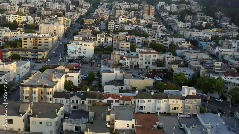 Aerial, tilt up, drone shot, over buildings and streets, in San Francisco city, at sunrise, on a sunny, summer morning, in California, USA Aerial, tilt up, drone shot, over buildings and streets, in San Francisco city, at sunrise, on a sunny, summer morning, in California, USA