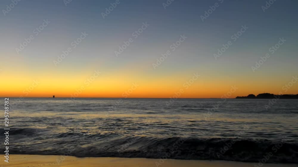 Sunset over the Pacific Ocean as seen from Baker Beach in San Francisco, California, USA. Sunset over the Pacific Ocean as seen from Baker Beach in San Francisco, California, USA.
