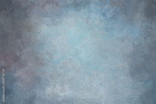 Tableau sur toile Blue painted canvas or muslin fabric cloth studio backdrop or background