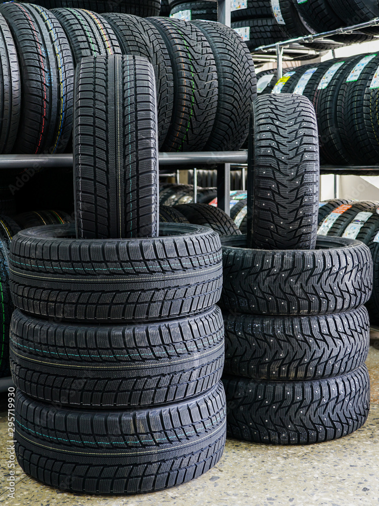 new winter tire sets with studs and without studs at tire shop new winter tire sets with studs and without studs at tire shop