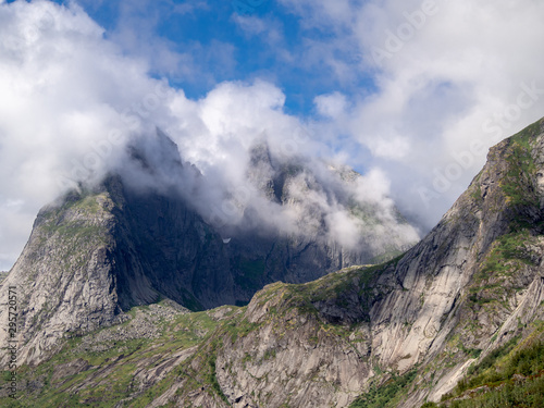 Clouds collide with the peaks of the mountain