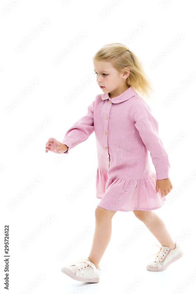 Charming little girl goes somewhere. The concept of family, happ Charming little girl goes somewhere. The concept of family, happ