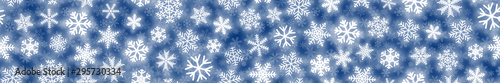 Christmas horizontal seamless banner of white snowflakes on blue background