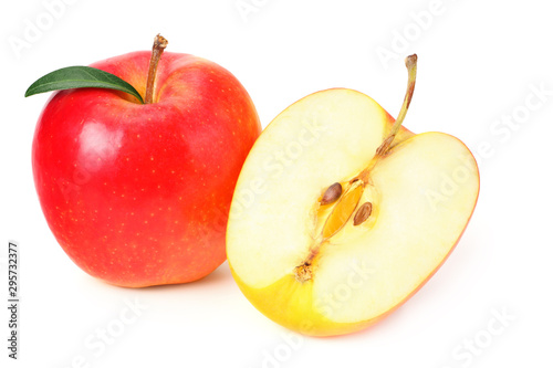 red apples with slices and green leaves isolated on a white background