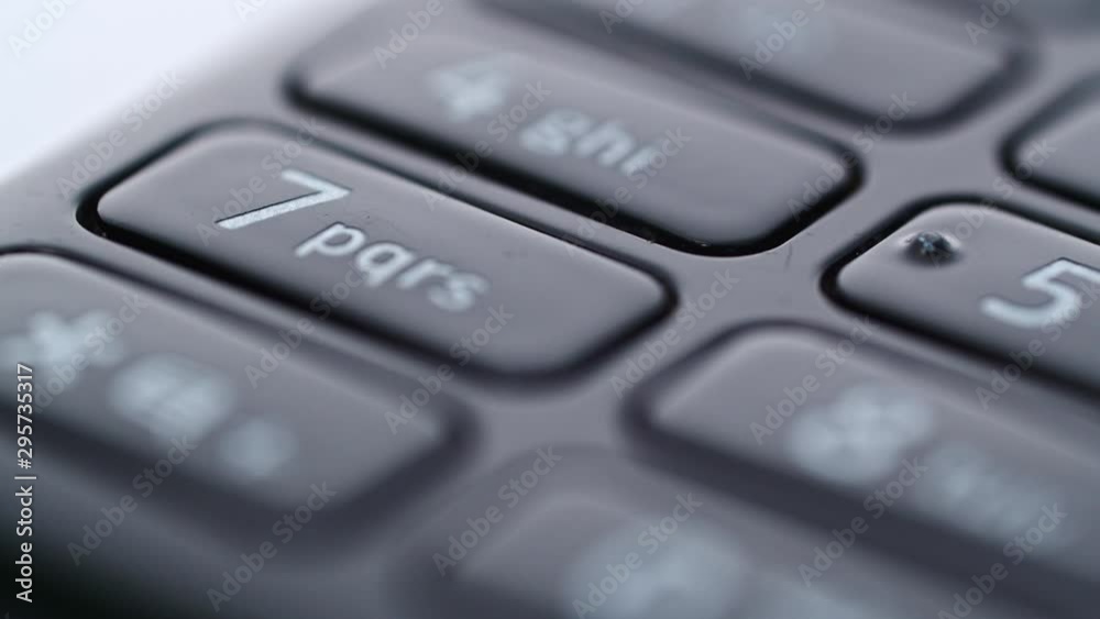 Close Up keyboard of the old Nokia 301 mobile phone. Tracking right shot Close Up keyboard of the old Nokia 301 mobile phone. Tracking right shot