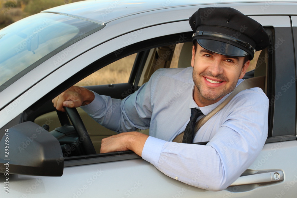 Attentive looking professional driver smiling Attentive looking professional driver smiling