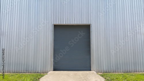 Roller shutter door metallic industrial frame. on white metal sheet background