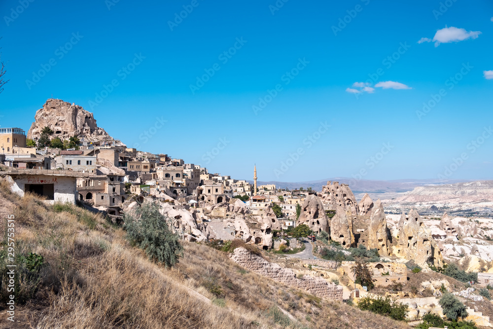 Panoramic photo of Uchisar carved old ancient houses with Pigeon Valley