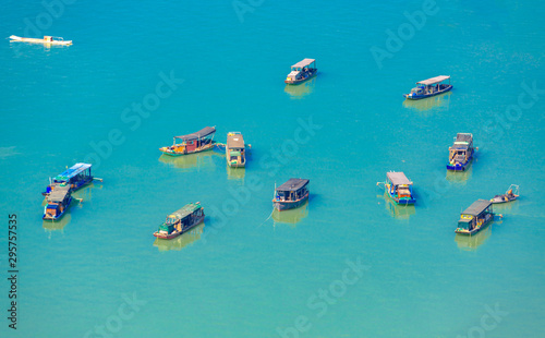 Fishing boats on the blue coast of The North Sea City of Guangxi © Weiming