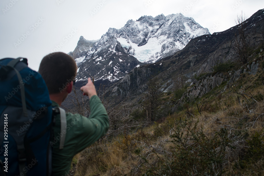  Hiker Pointing At Torres del Paine National Park Mountain Peak, Chile