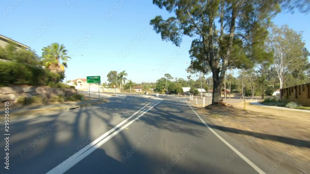Rear facing driving point of view POV of quiet Australian country roads - ideal for interior car scene green screen replacement Rear facing driving point of view POV of quiet Australian country roads - ideal for interior car scene green screen replacement