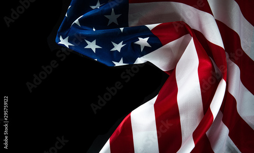 Fototapeta Naklejka Na Ścianę i Meble -  American flag on a black background with space for text