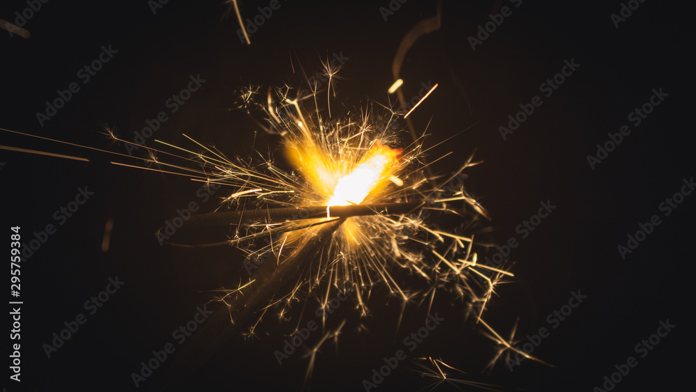 Fototapeta premium sparkler on black background
