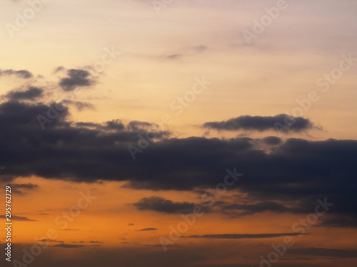 Dark gray clouds on a red sunset sky © zah108