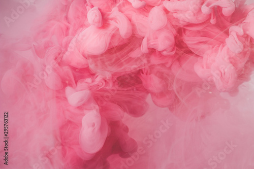 Pink color explosion. Colorful ink in water. Abstract background