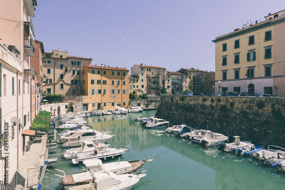 Panoramic view of historic buildings of Lovorno with water canal