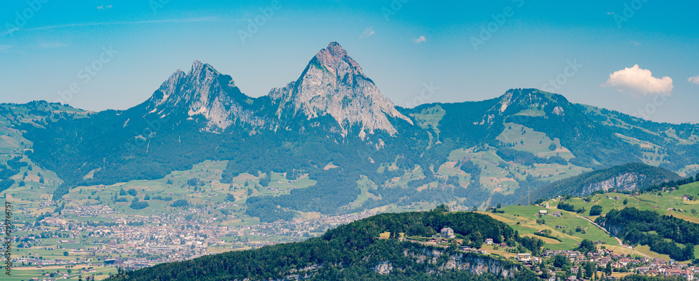 Switzerland, Panoramic view on green Alps, Morchach and Mythens mountains.