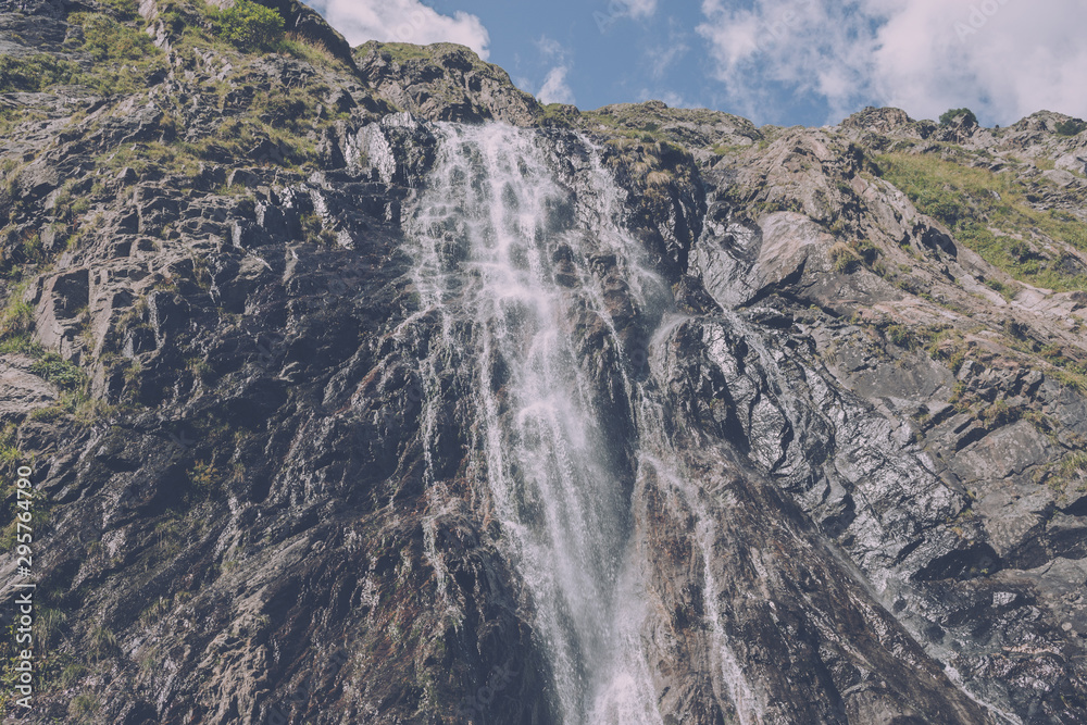 Obraz premium Panorama view of waterfall scene in mountains, national park of Dombay, Caucasus