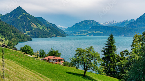Switzerland, Panoramic view on green Alps and lake Lucerne near Buochs village