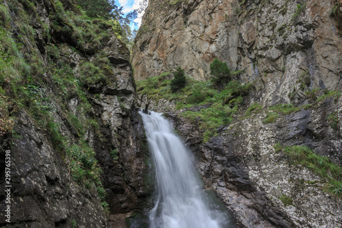 Closeup view of waterfall scenes in mountains  national park Dombay  Caucasus