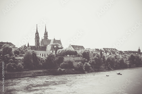 View on Basel city and river Rhine  Switzerland. People swim in water
