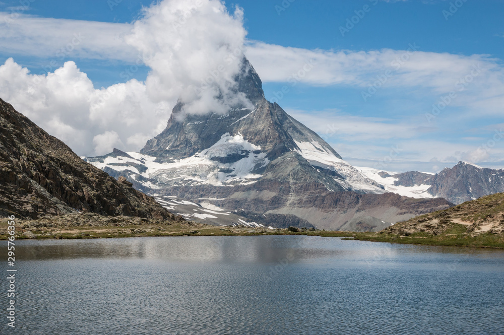 Panorama of Riffelsee lake and Matterhorn mountain in national park Zermatt