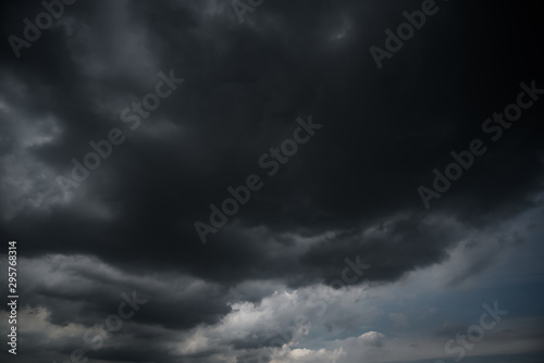 dark storm clouds with background,Dark clouds before a thunder-storm.