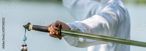 Photography Tai Chi Chuan Master hands holding sword, Chinese Martial Arts workout