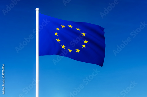 Waving flag of European Union on the blue sky background
