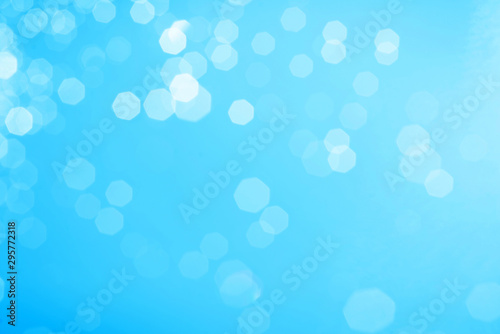 Blue bokeh image for background, Empty space. Blurred bright light.