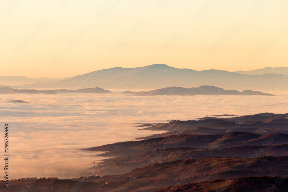 Sea of fog and between mountains and hills