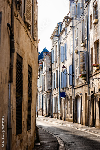 Fototapeta Naklejka Na Ścianę i Meble -  Scenic view of narrow street in the historic centre of La Rochelle, France