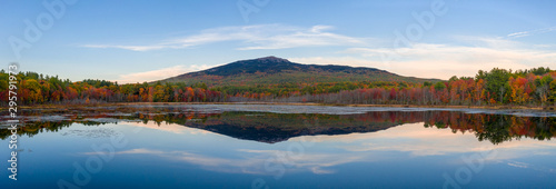 Mount Monadnock, New Hampshire. Aerial drone view over water in autumn with reflection. photo