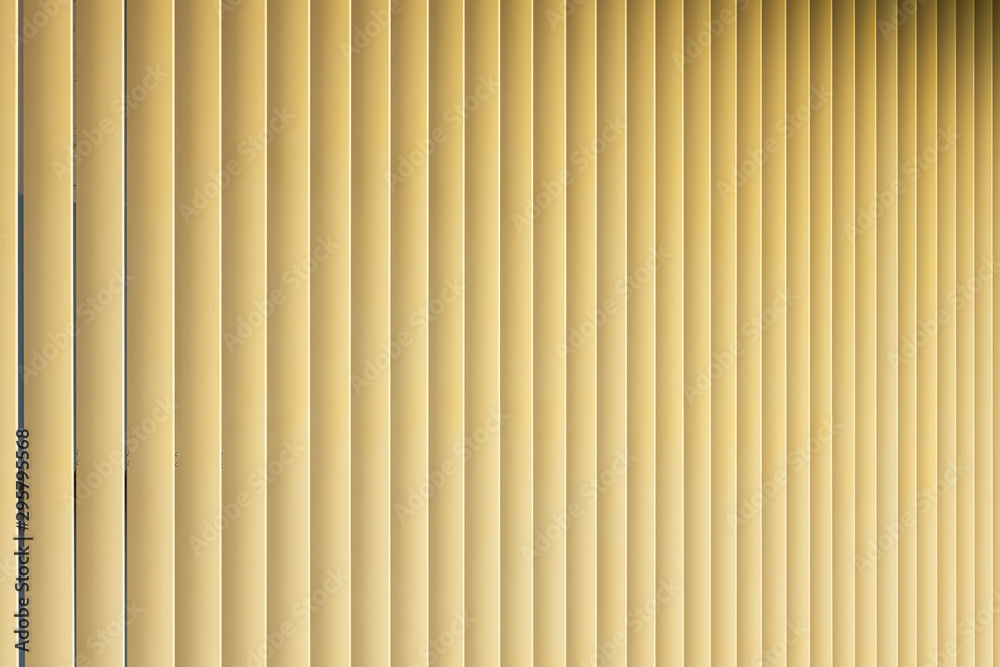 Fototapeta premium Front view of beige or golden 3d stripes. Louvre shutters like pattern with gradient.