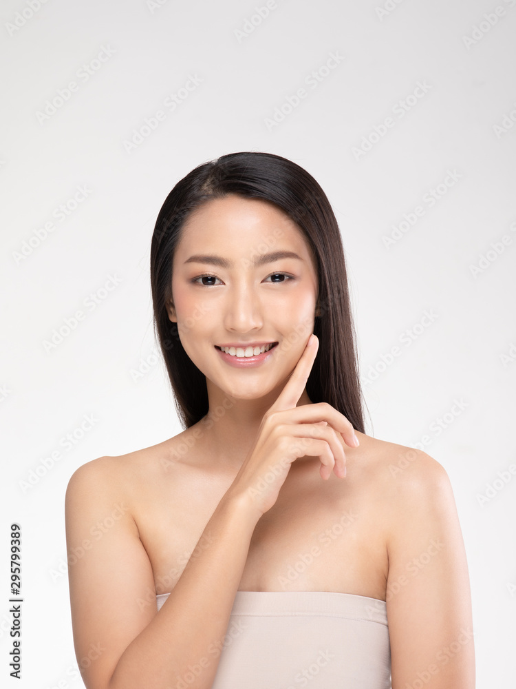 Beautiful Asian young woman touching soft cheek smile with clean and fresh skin Happiness and cheerful with positive emotional,isolated on white background,Beauty and Cosmetics Concept Beautiful Asian young woman touching soft cheek smile with clean and fresh skin Happiness and cheerful with positive emotional,isolated on white background,Beauty and Cosmetics Concept