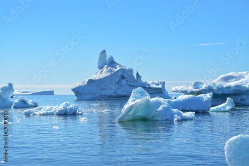 great views over ice fjord in Ilulissat Greenland - beautiful icebergs in the Disko Bay / Baffin Bay - blue sky, ice sea