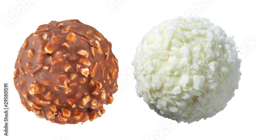 Beautiful pair of white and dark chocolate ball shaped candies with filling, nuts and coconut shavings isolated on white background. Full sharpness across the entire field of the frame.