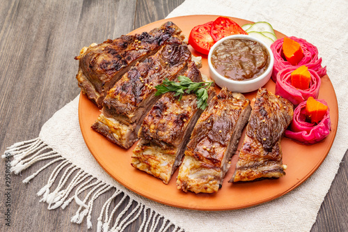 BBQ pork ribs with fermented, baked and fresh vegetables