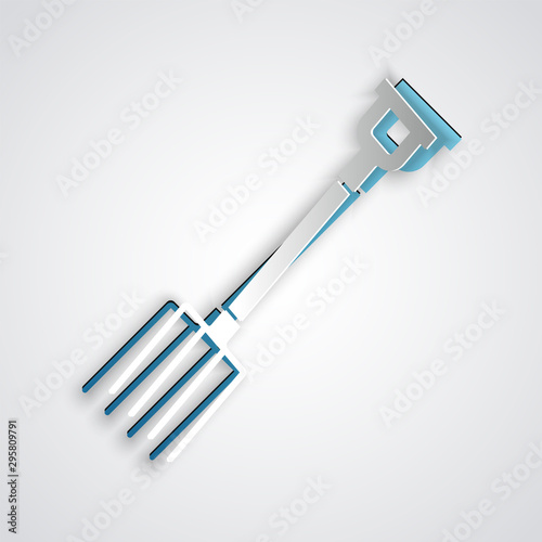 Paper cut Garden pitchfork icon isolated on grey background. Garden fork sign. Tool for horticulture, agriculture, farming. Paper art style. Vector Illustration photo