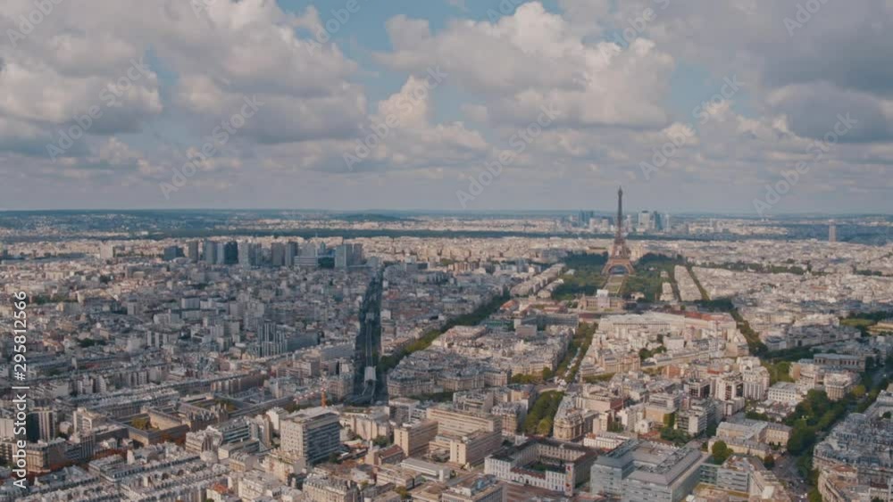 4K Aerial Paris panoramic city view, Champ de Mars and Eiffel Tower bird's-eye view during daytime - Slow Motion 4K Aerial Paris panoramic city view, Champ de Mars and Eiffel Tower bird's-eye view during daytime - Slow Motion